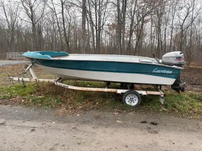 16’ Fiberglass boat and trailer. 30hp engine. Was winterized and has been sitting for a few years. B...