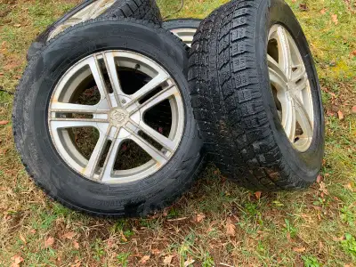 4 Toyo 245/65 R17 light truck or SUV tires on dual pattern aluminum rims with TPS sensors, hubcaps,...