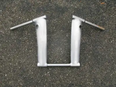 Those ape hangers will fit any bike with 1" handlebars. Very heavy construction. They are 15" high a...