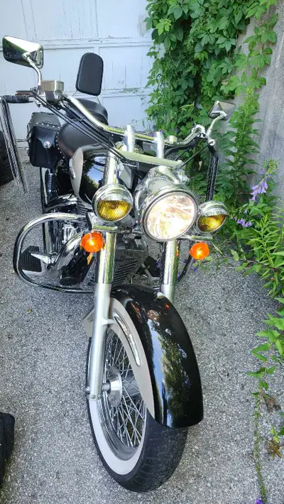 Classic Honda Aero VT1100 motorcycle with plenty of chrome detailing. Comes equipped with studded sa...