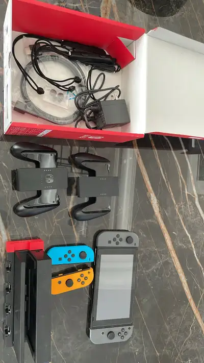Moving Sale! Nintendo Switch 1, with extra set of joycons, View more