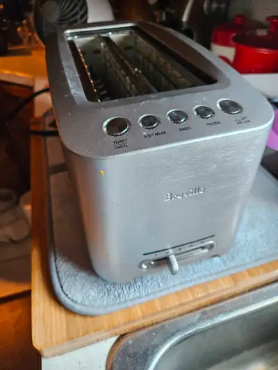 Breville 4 slice toaster, was reg. 200.00, I paid 144.00 and tax, have the instruction manual