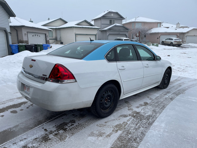 2011 Impala two sets of tires in Cars & Trucks in Red Deer - Image 2