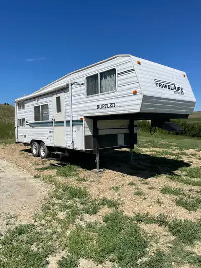 1998, 26.5 foot Travelaire Rustler camper. Has bunk beds and AC. Decent trailer, we’ve had it for a...