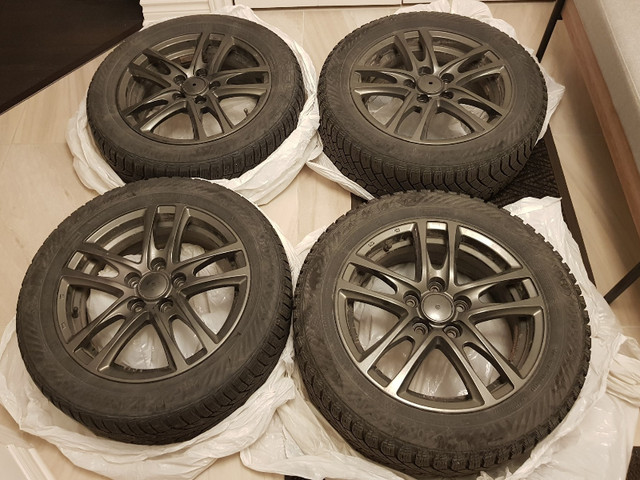 4 Pneus d'hiver avec jantes/Winter tires & mags - 205/55R16 94T dans Pneus et jantes  à Longueuil/Rive Sud