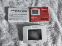 Honeywell Programmable Thermostat- model number TH8320U - touchs