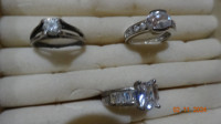 3  Rings, look like diamonds . Sparkly . great settings, tested