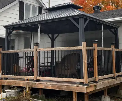 You take it apart. 12x10. This sturdy pre-owned hardtop gazebo features a durable black metal frame...