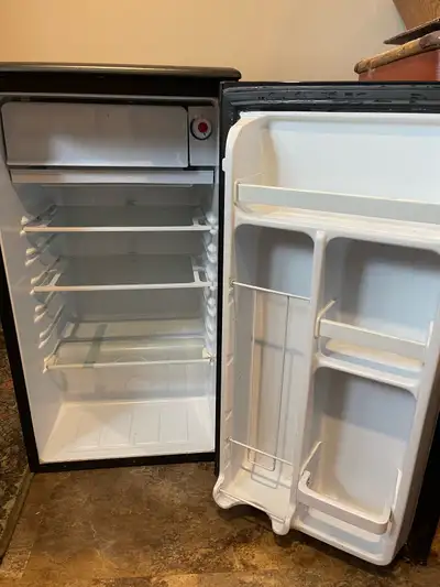 Black fridge/freezer used as bar fridge, no more bar. Must go. Excellent condition.