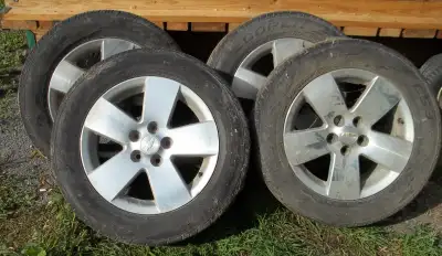 These are 4 16-inch alloy rims from an HHR made by Chevrolet.NOTE:The tires are poor. They will fit...