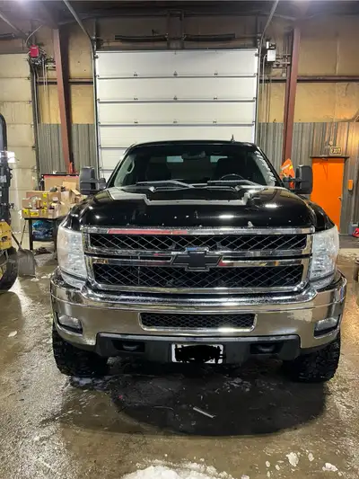 2011 Chevrolet Silverado 2500 HD LTZ 3/4ton with 6 inch ProComp suspension lift sitting on 36’s for...