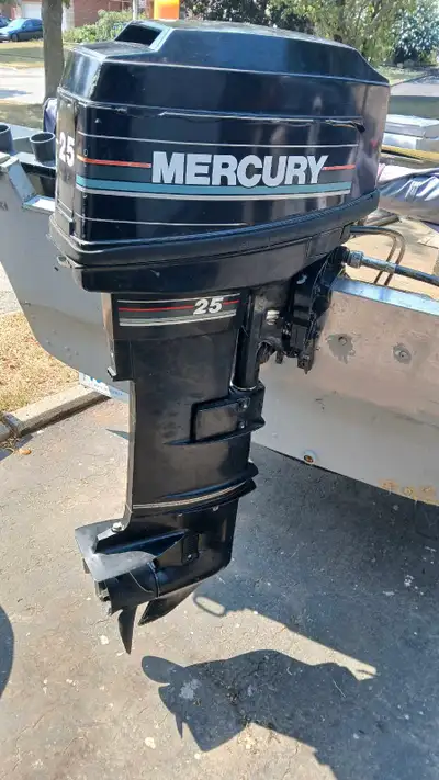 I'm selling a functional Mercury 25 hp working boat motor, perfect for small to medium-sized boats,...