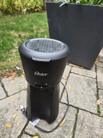 BRAND NEW(Original tumbler got misplaced, but I can offer a different one) Oster Coffee Maker with R...