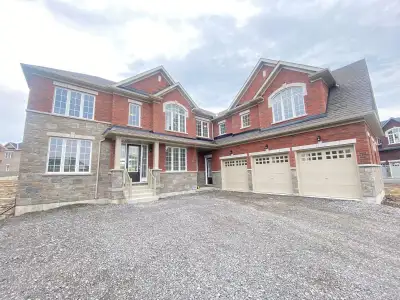 Live in This Beautiful Estate Community! This Sunfilled Brick and Stone 3500 Sqft Home Features a 3...