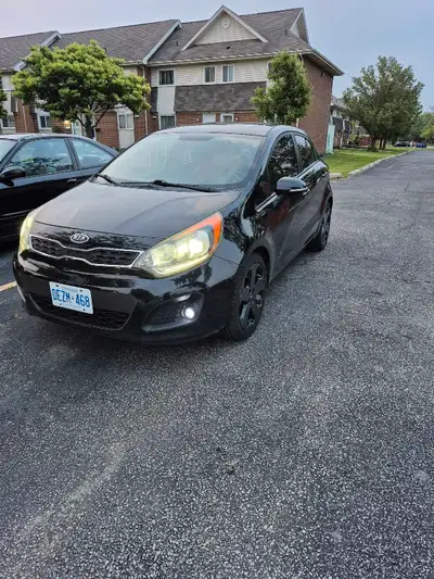 I am selling my 2013 Kia Rio, a compact hatchback that's great for city driving and beyond. It featu...