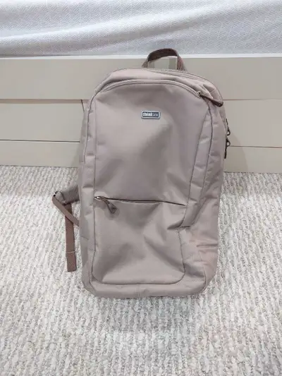 In great condition. It has built in pouches for cameras and lenses. Solid, well-built backpack.