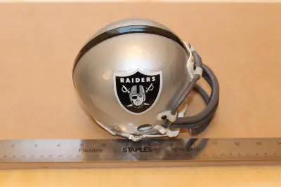 Indulge in nostalgia with this dated (1995) mini collectible helmet, a standout piece destined to ad...