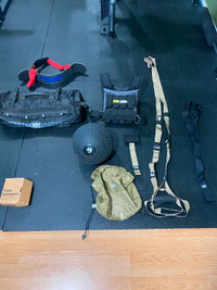 Gym accessories. Slam Ball, Weighted Vest, TRX, Sandbag, Curl