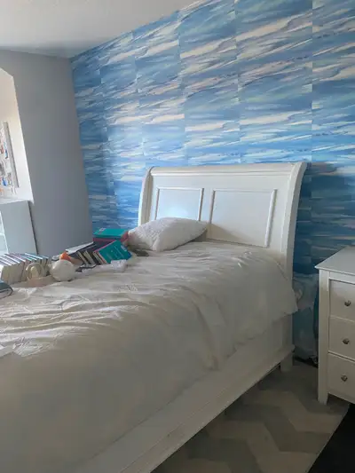 White sleigh bed frame for double bed. Matching 6 drawer dresser also available Bed frame $100 Dress...