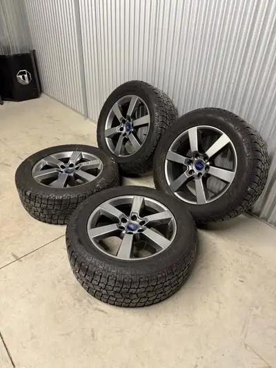 20” OEM Ford Sport 6x135 bolt pattern rims with OEM Tpms + 275/55R20 Toyota Open Country AT2 tires....