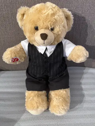 This special edition rare cuddly Build-A-Bear with matching formal wear is ready to celebrate in sty...