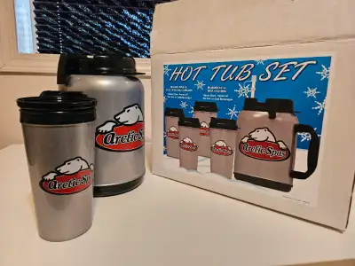 Carafe and 4 mug set. Perfect for the hot tub experience. Never used, still in the box.