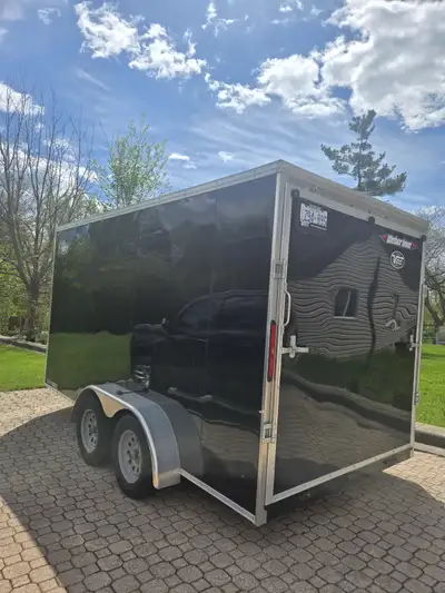 I'm selling a barely used Weberlane enclosed trailer that's ready for any hauling task! This 2025 mo...