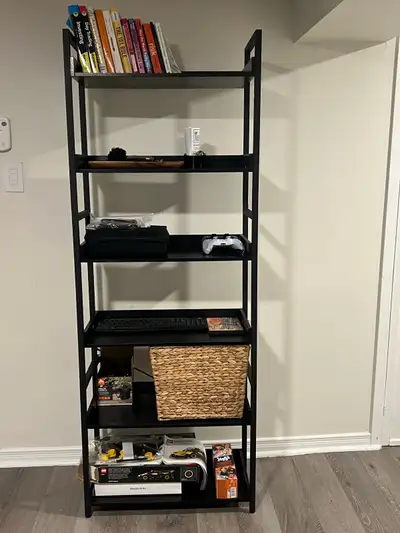 Black 6-tier ladder-style bookshelf with open shelving. Sturdy metal frame with wood shelves. Perfec...
