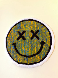Hand made smiley wall rugs 