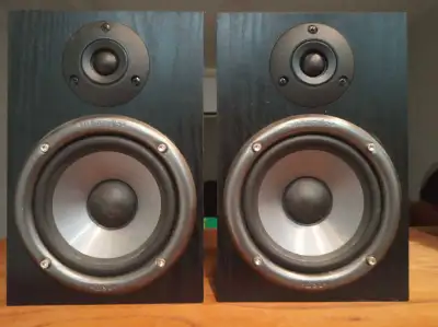 These speakers have their own built in amps and require input from a line level signal, such as from...
