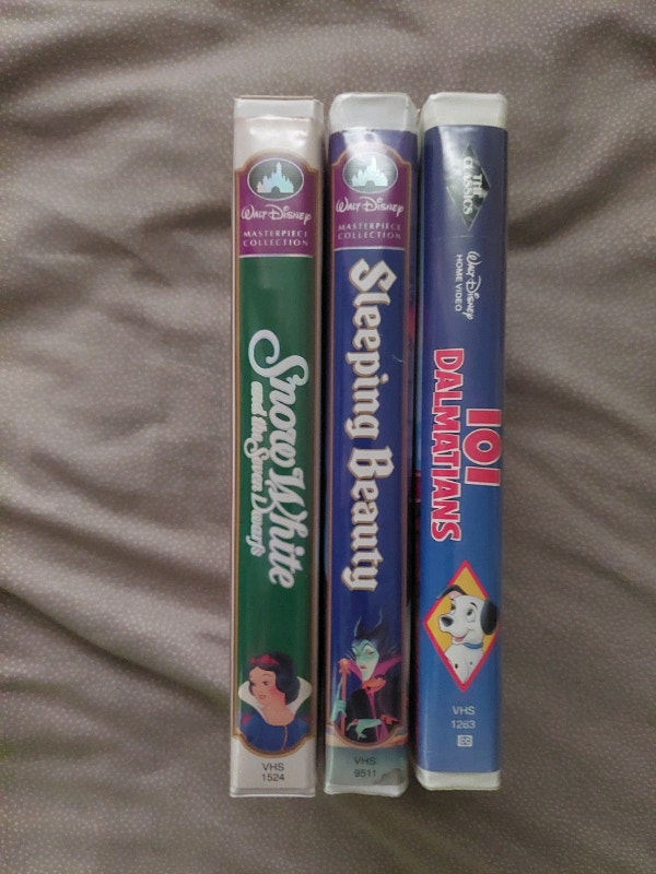 The VHS tapes 101 Dalmatian's sleeping beauty and snow white Arts