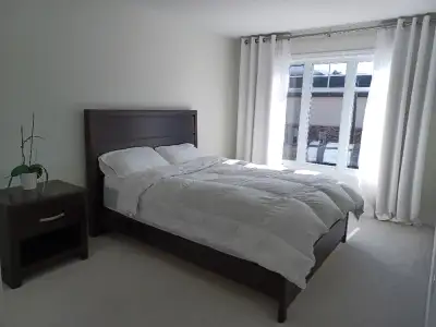 A furnished room for rent ( Queen size bed ) in a beautiful new construction semi-detached house loc...