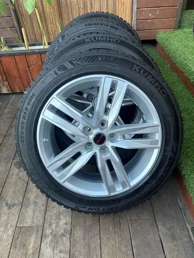 Almost new kumho studded winter tires with alloy wheels 5x114.3 bolt pattern