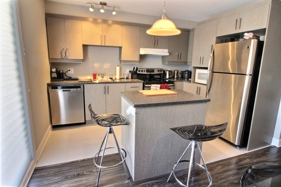 Condo 4 1/2 Rez-de-jardin De Luxe 2