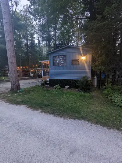 Beautifully renovated park model trailer. Sleeps 6, bedroom with a queen bed and an additional adult...