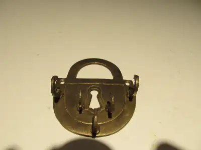 Antique brass key holder., View more