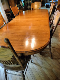 Solid oak dining room table, 6 chairs, & corner hutch