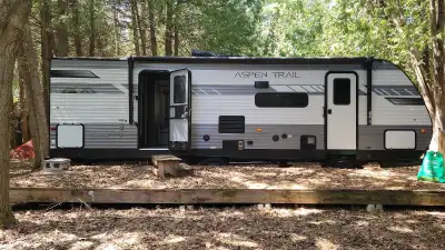 Beautiful barley used family trailer for sale. It's a 2022 Dutchmen, Apsen Trail. Master room with l...