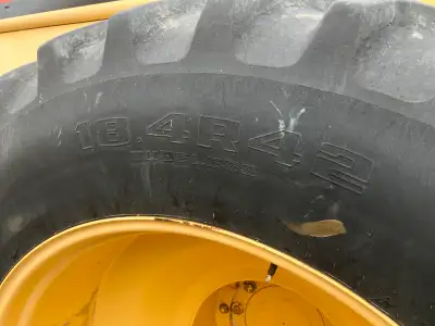 18.4 X 42 Radials on the combine rims. Some cracks, not too bad. $600 each or 4 for $2000. Located i...