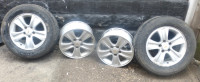 Set Of 225-60 R16 aluminum Chevy Rims And 2 Tires 16" inch 5 bol