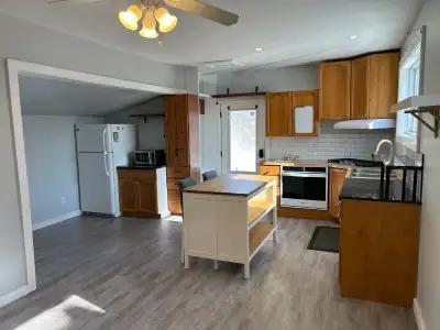 2 BR, 1 Bath + Den for rent. Main floor and basement totalling 900 sq ft. Rent includes parking for...