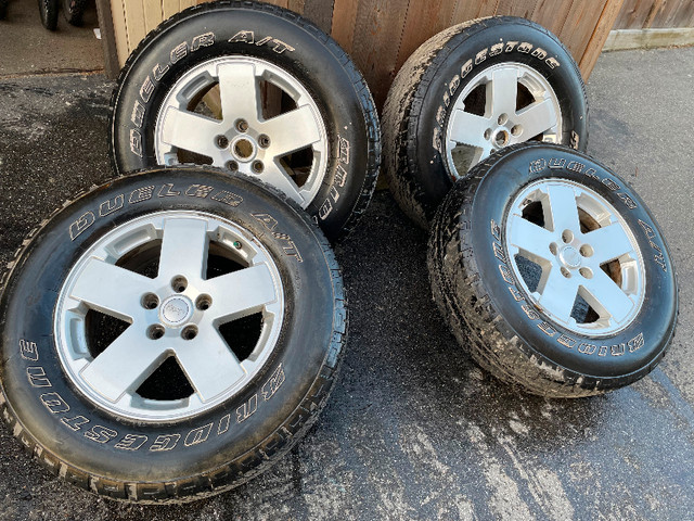 4 wheels  for a Jeep, R18 with tires in Tires & Rims in Abbotsford