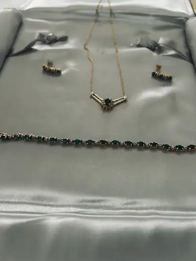 Gold and Emerald with diamonds , View more