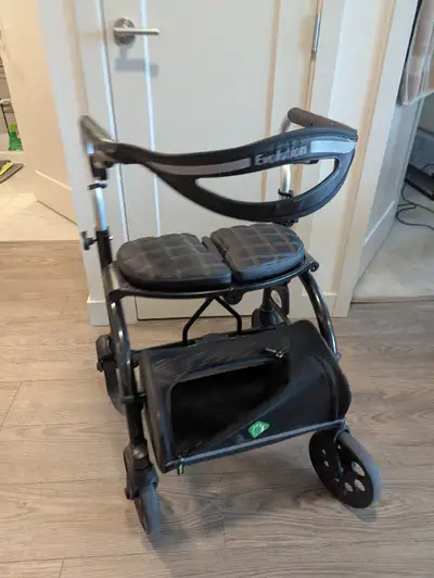 Evolution Mobility walker Four wheels In great used condition Height adjustable Non smoker no pet ho...