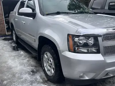Well maintained, new exhaust, lower ball joints and brake pads . 20” summer wheels/tires and winter...