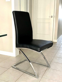 4 black faux leather chairs