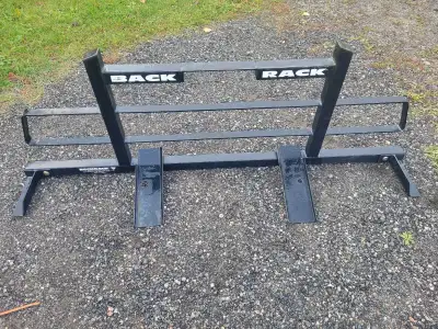 Good condition back rack came off 2018 silverado fits gmc as well 2018 and older No reasonable offer...