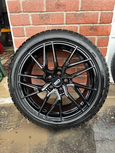 4 Gloss black Eurodesign Alloy wheels with Antares grip 20 snow tires. 2 seasons on the tires and th...