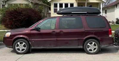 The Mercedes-Benz Dachbox 450 is a premium, aerodynamic rooftop cargo container designed specificall...