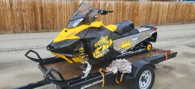 Great running, low kms, Good overall shape. Skidoo storage bag, New Battery this Feb. WOULD CONSIDER...